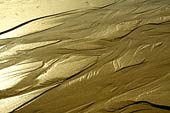 Ruissellement d'eau sur du sable