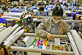 Ouvrières dans l'atelier de broderie de Thang Loi - Hoi An - Viêtnam